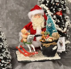 Santa Claus With Sack And Rocking Horse